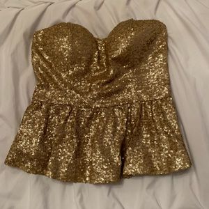 gold sparkly peplum top